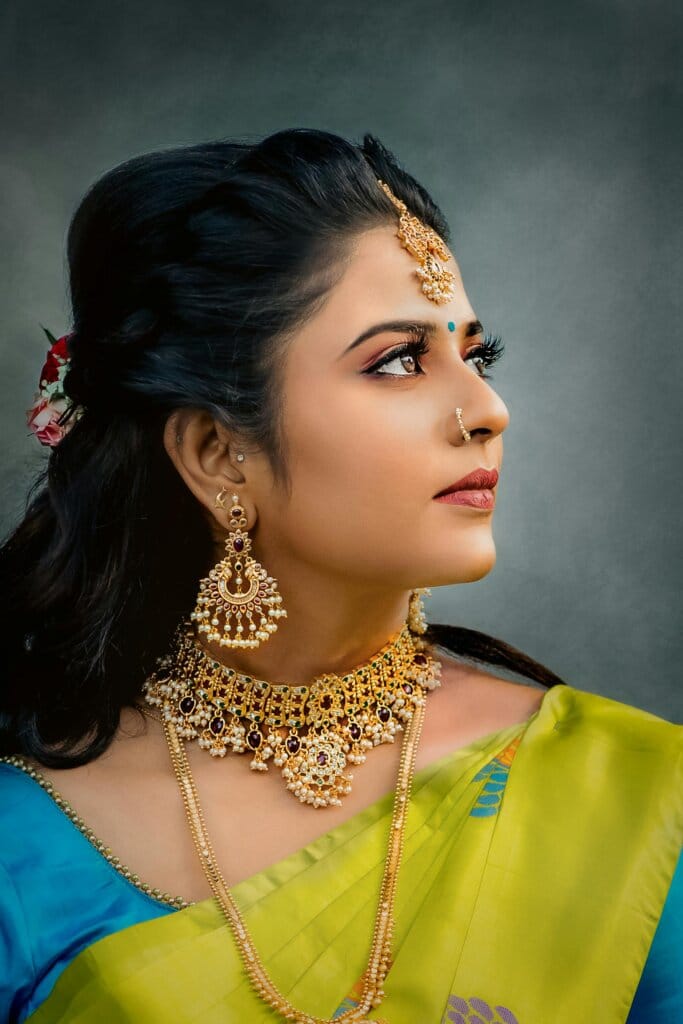 pexels-photo-10336753-10336753 Close-up of a woman in traditional attire with stunning jewelry, graceful side profile.