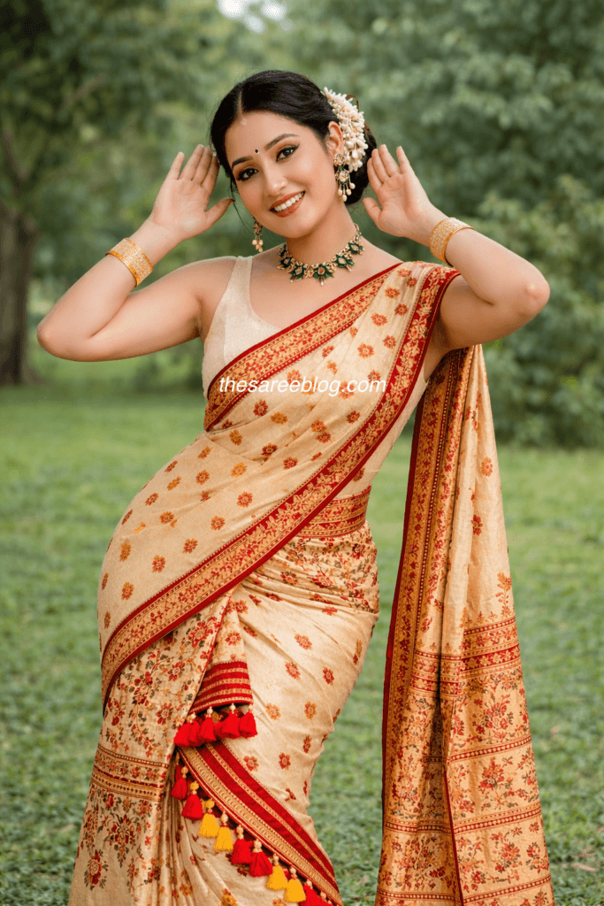 woman wearing mekhela chador posing in bihu pose